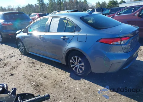 2021 Toyota Corolla Hybrid Le z USA, uszkodzony, nr VIN JTDEAMDE7MJ018687